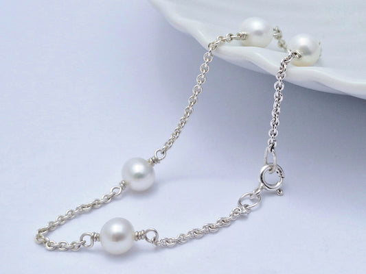 Spaced White Pearl Bracelet